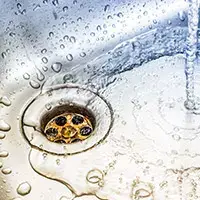 plumbers fix clogged drain Wood River Illinois